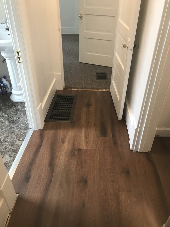 Hallway to bath and rear bedroom - 435 E 27th St