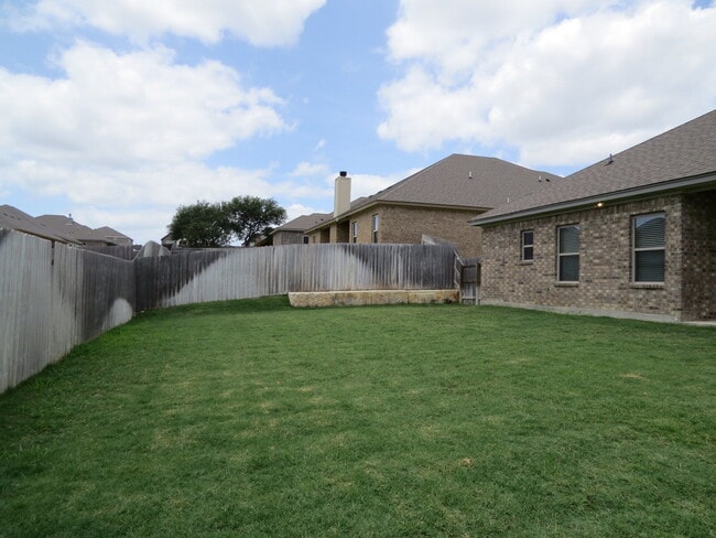 Building Photo - "Charming 4-Bedroom Retreat with Granite Elegance & Cozy Fireplace in Killeen!"