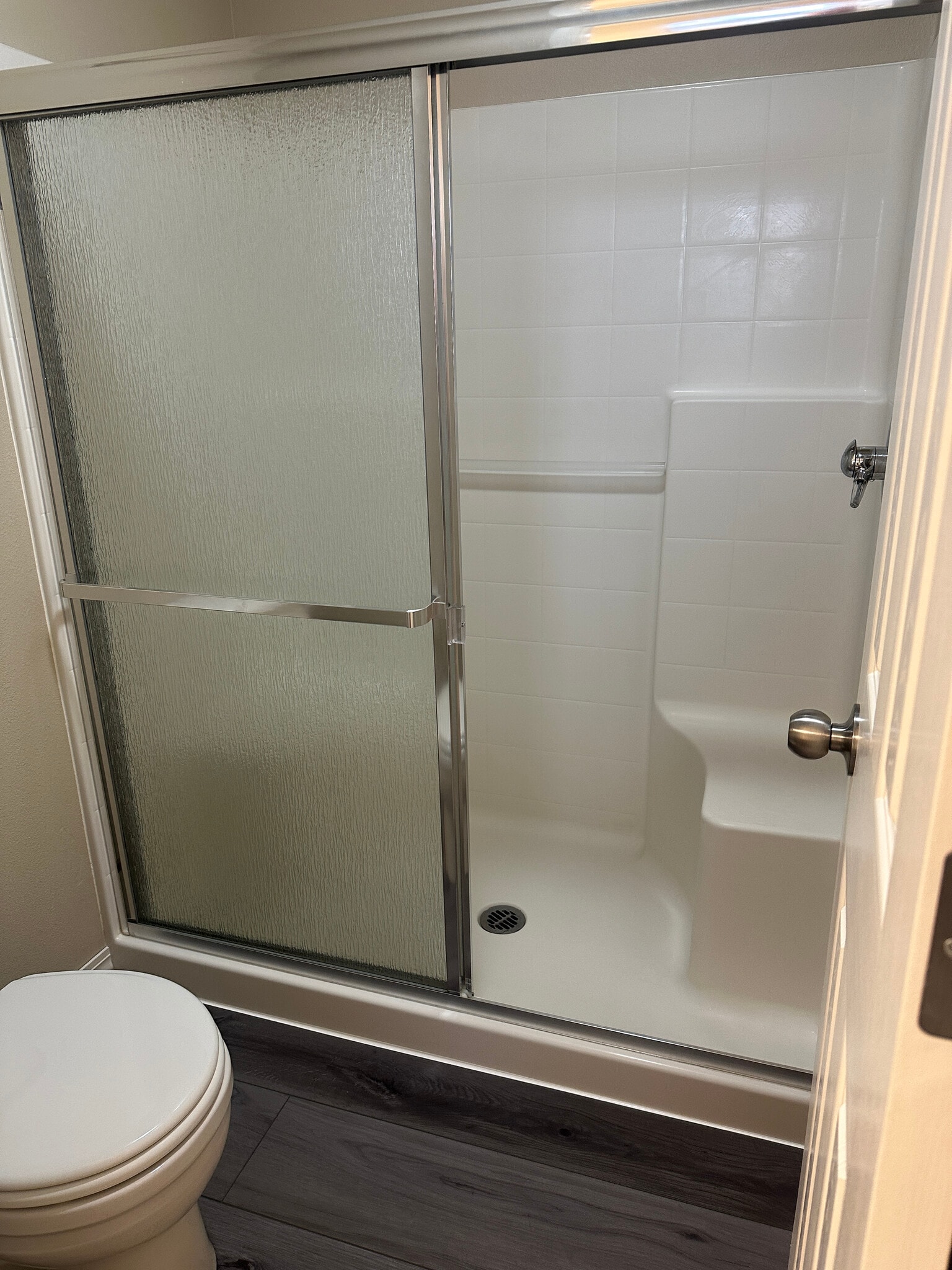 Master Bathroom shower and toilet area - 20878 Nova Loop