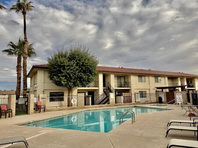 Building Photo - New Flooring, no carpet. 2bed 2bath Gated Community with a Swimming Pool