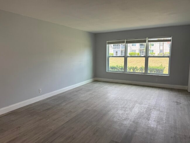 Building Photo - 7355 Woodmont Terrace