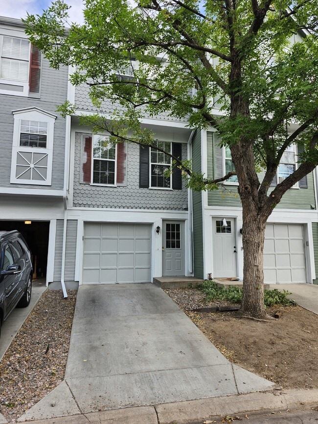 Building Photo - Available Now! "Charming 2-Bed Townhouse with Fireplace Oasis on South Trenton Street!"