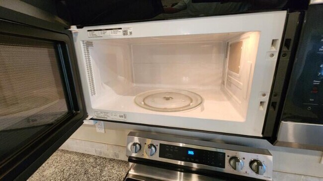 Building Photo - 13609 Sherman Ave