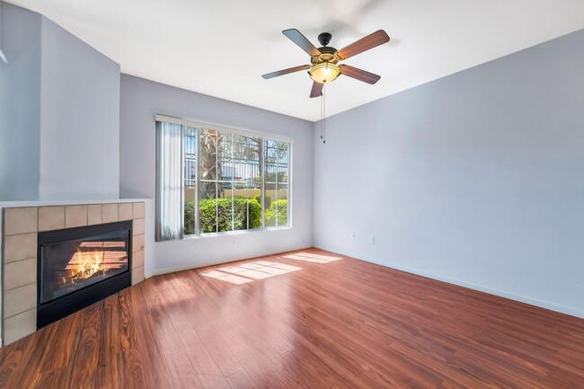 Building Photo - Modern Ground-Level Condo With A One Car Garage in Prime Southwest Location with Resort-Style Ame...