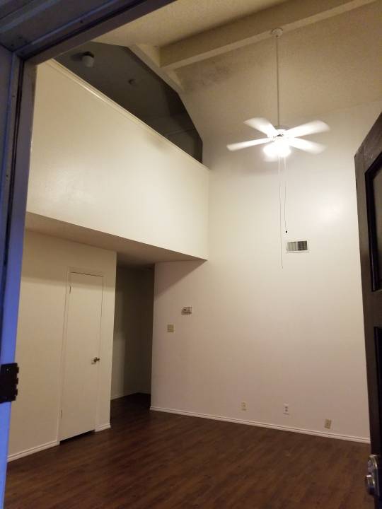 High ceiling with two bedrooms and one bath upstairs. - 7235 Rimwood St