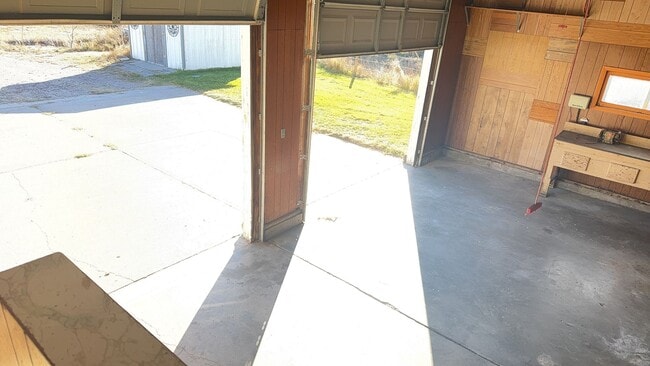 Building Photo - Spacious, four-bedroom, two-bathroom, coun...