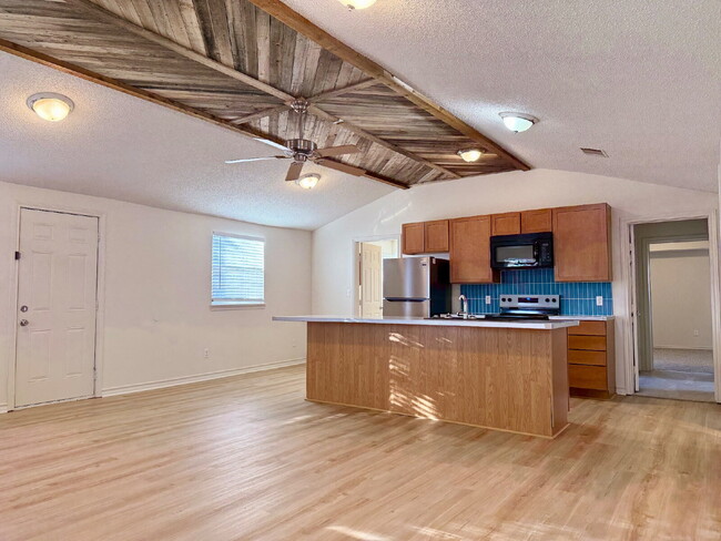 Building Photo - Modern Elegance Meets Location: High Ceilings, Updated Fixtures, Move-In Ready!