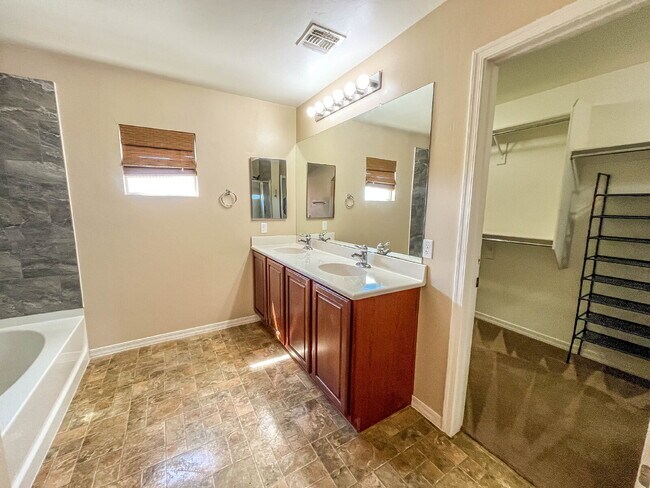 Building Photo - Spacious Rancho Sahuarita Home with Solar, 3-Car Garage, Desert Views and Oversized Loft $500 off...