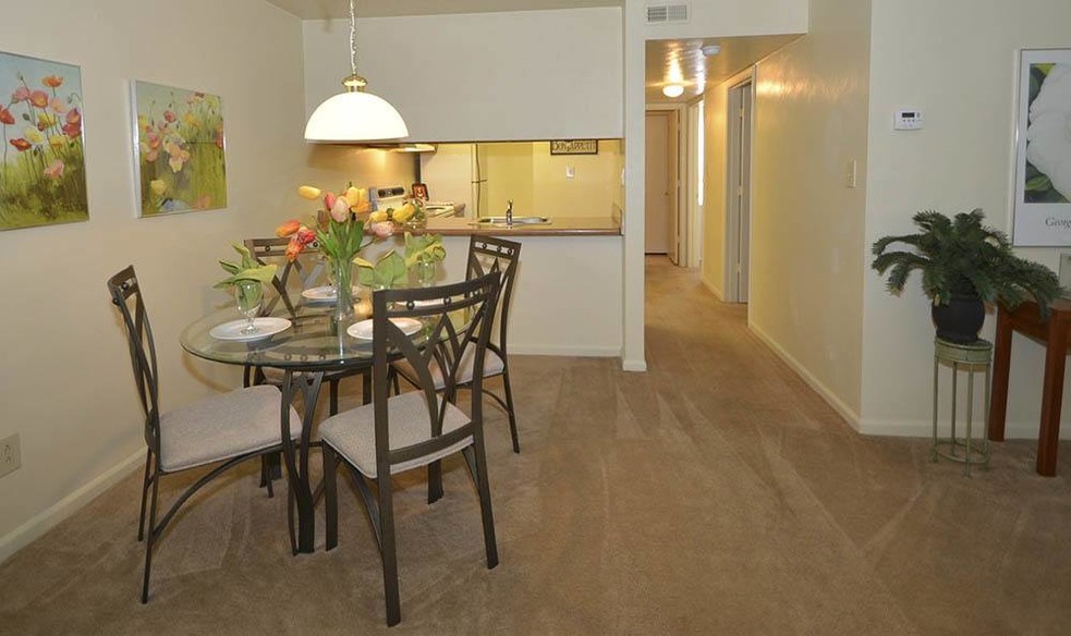 Non-Renovated Sandpiper Dining Area - Pipers Landing Apartments