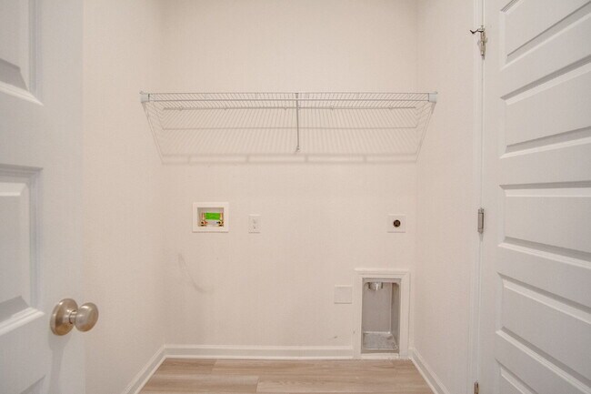 Building Photo - 3BR/2BA Home Near Navy Federal Featuring Quartz Counters, 2-Car Garage & Internet Included