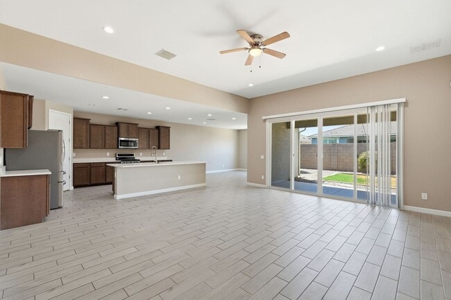 Building Photo - Spacious 5-Bedroom Home with Open Floor Plan & Private Backyard