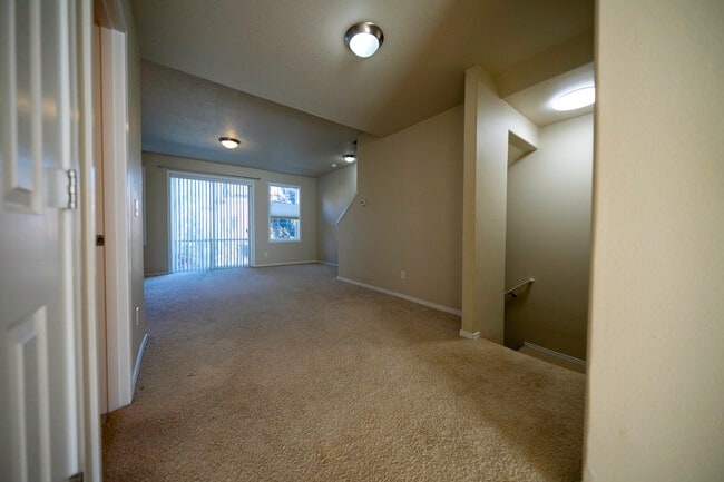 Top of stairs, main floor toward living room - 4828 SE Teakwood St
