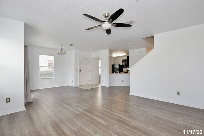 Building Photo - Spacious 3/2.5 Townhome with a 2 Car Garage and a Beautiful Pond View in Westwood Condos - Orlando!