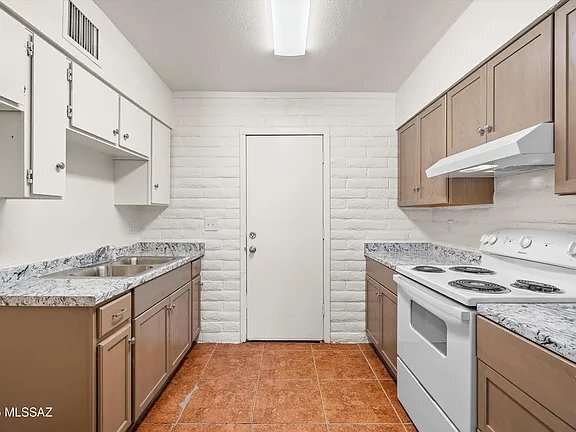 Building Photo - 1408-1410 N Hualpai Rd