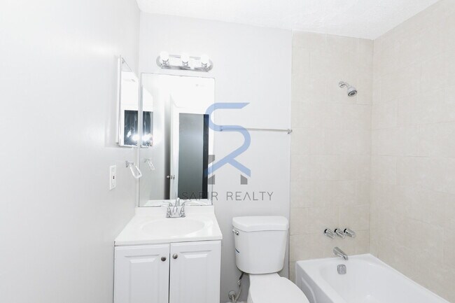 Building Photo - Move in before November 30th and choose your reward: a $250 Amazon Gift Card or a 55" Smart TV!