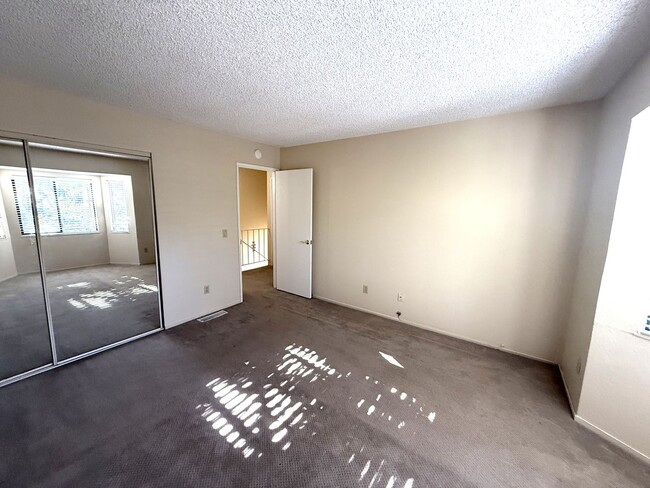 Building Photo - TWO BEDROOM / ONE BATH TWO-STORY CONDO IN ...