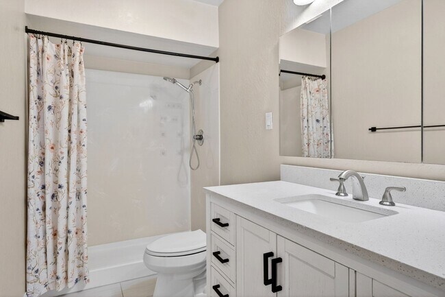 Building Photo - Updated Ground-Floor End Unit with Pool Access & No Stairs in West Roundtree!