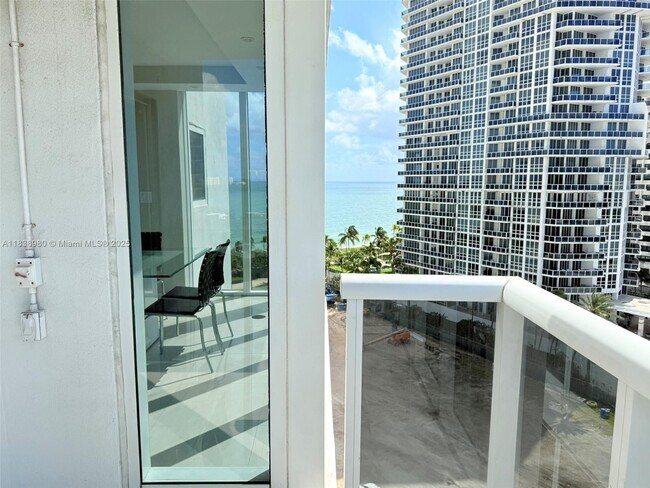 Building Photo - 10275 Collins Ave