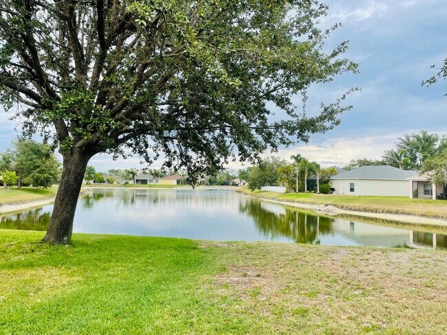 Building Photo - **SUNCOAST LAKES GATED COMMUNITY**