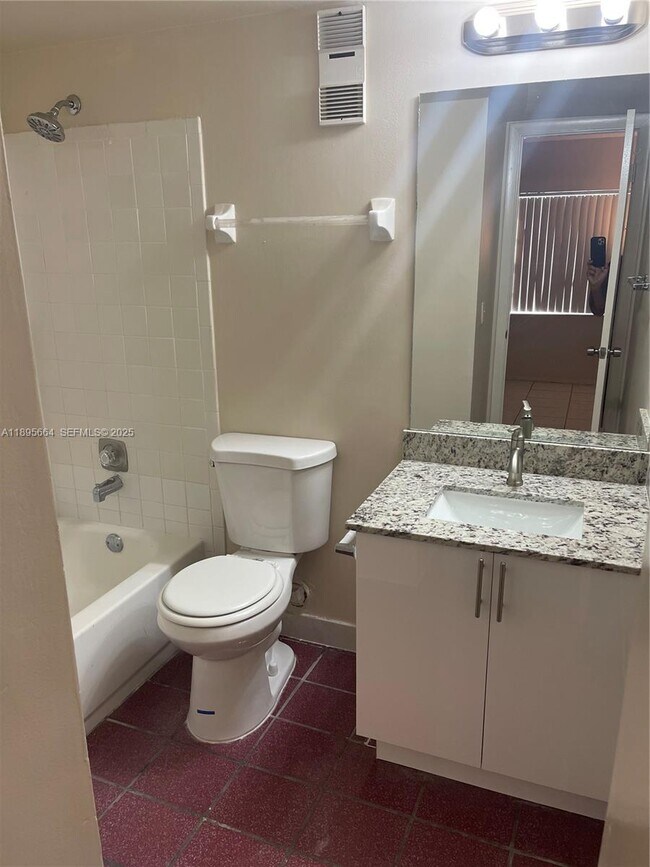 Building Photo - 10818 Royal Palm Blvd