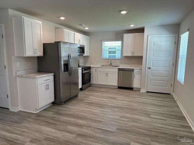 Building Photo - 6497 Firefly Dr