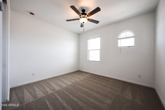 Building Photo - 7695 W Smoketree Dr