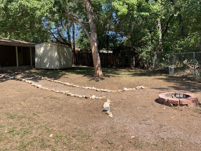 Building Photo - STUDENTS WELCOME! Sprawling Ranch Home w/ Large Fenced Yard
