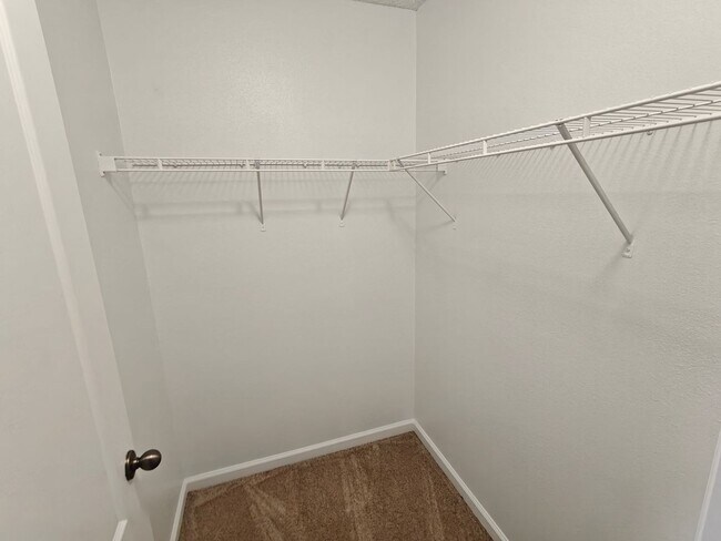 Building Photo - Spacious 2-Bed, 2.5-Bath Townhome with Gar...