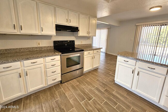 Building Photo - 8220 W Monaco Blvd