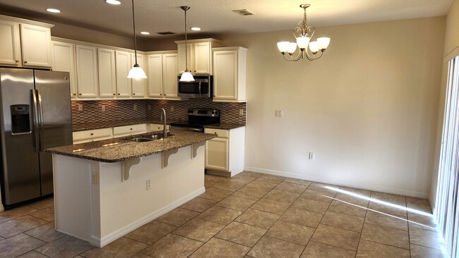 kitchen - dining area - 233 Tarracina Way