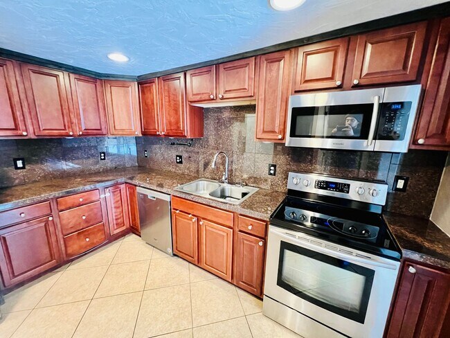 Building Photo - UNIVERSITY HILLS, CHARMING RANCH HOME, UPDATES THROUGHOUT, 3 BED, LARGE YARD, DECK AND PERGOLA .