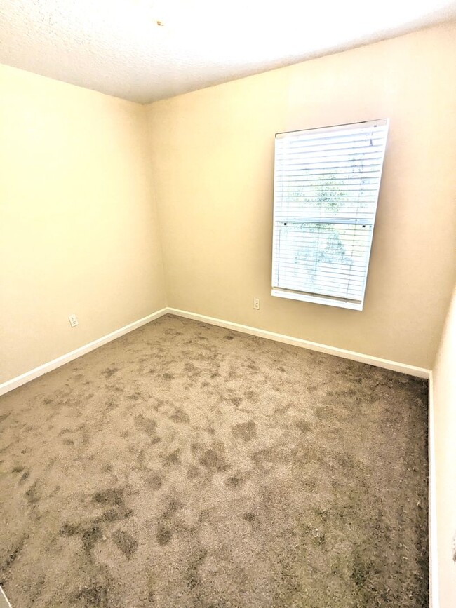 Building Photo - 4 Bedroom Port Orange, Coquina Cove - Town...