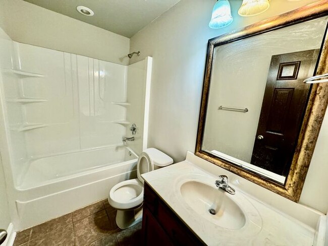Building Photo - Home available in popular area