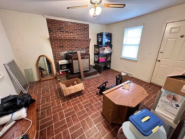 Building Photo - 4-Bedroom Brick Home with Full Unfinished ...