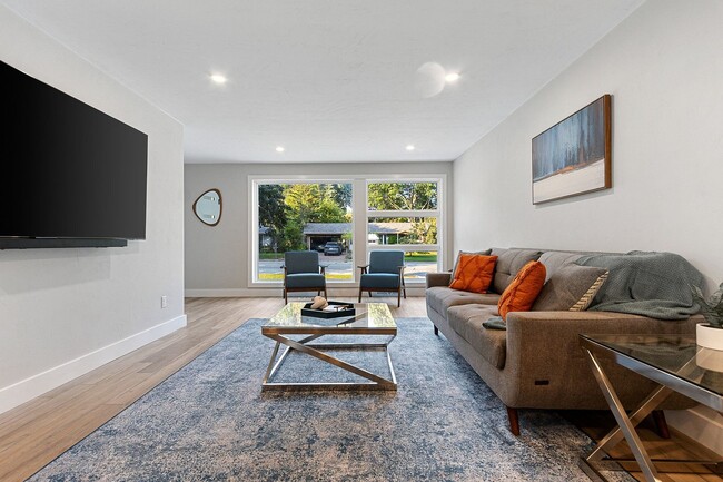 Building Photo - FURNISHED RENTAL: New Mid-Century Mod on M...