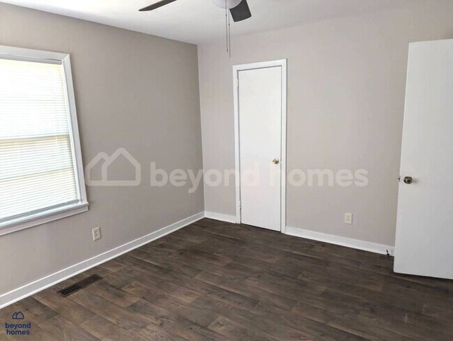 Building Photo - Updated Bungalow with Massive Deck and Fully Fenced Yard!