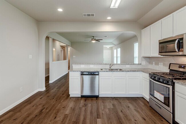 Building Photo - 4922 Blue Jacaranda Wy
