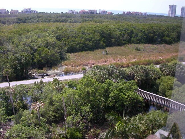 Building Photo - 7225 Pelican Bay Blvd