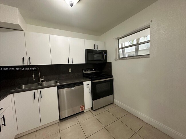 Building Photo - 4215 N University Dr