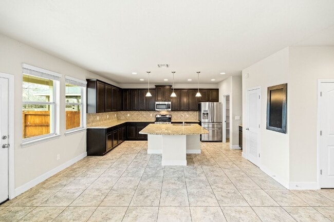 Building Photo - A Home That Adapts to You – Luxury, Flexibility & Entertainment Await!
