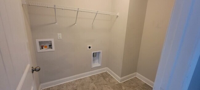 Building Photo - Spacious Elegance Awaits: 4-Bedroom Gem with Granite Countertops on Harrington Road!