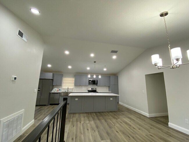 Building Photo - Totally refurbished three bedroom, two bat...