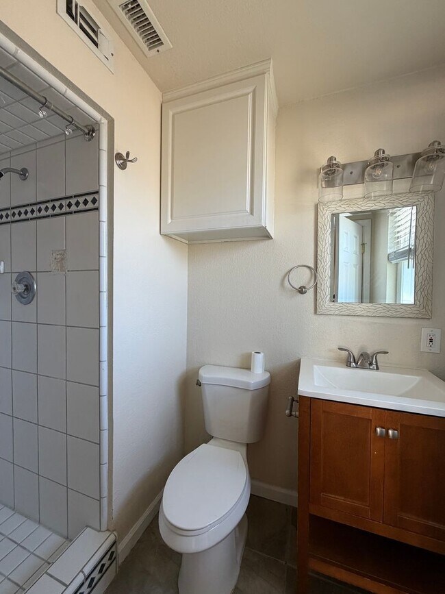 Building Photo - 3 Bedroom 2 Bathroom House with Central A/C , 2 Car Garage and Beautiful Backyard with Covered Patio