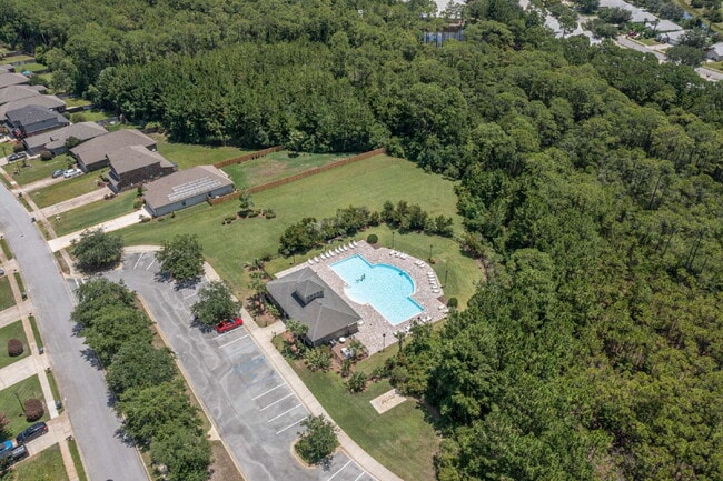 Building Photo - "Coastal Elegance Awaits: Spacious 4-Bed Oasis with $400.00 Off First Full Months Rent!"