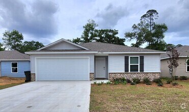 Building Photo - This attractive 3/2 Newer Home is situated...