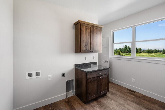 Building Photo - Lock-and-Leave Luxury Living — Lawn Care & Snow Removal Included!