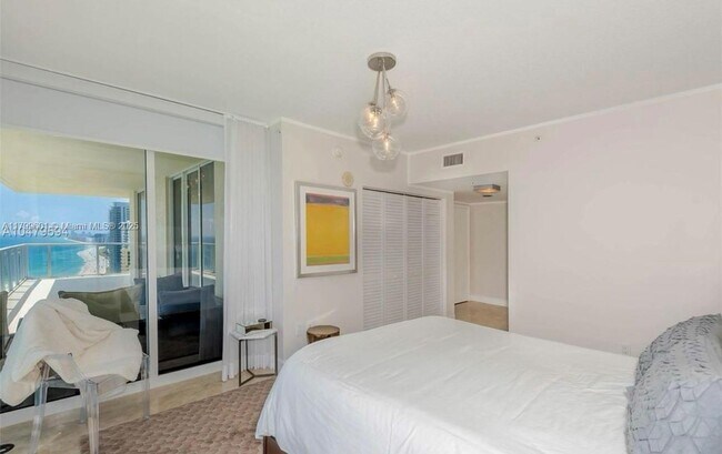 Building Photo - 16699 Collins Ave