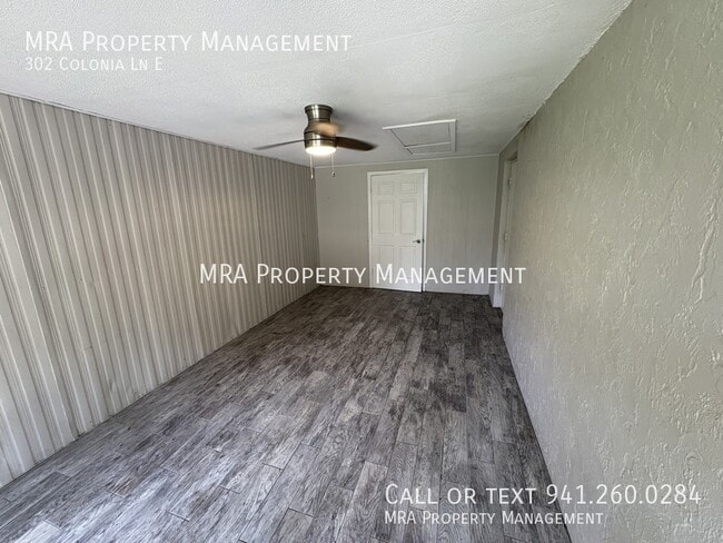 Building Photo - 302 Colonia Ln E