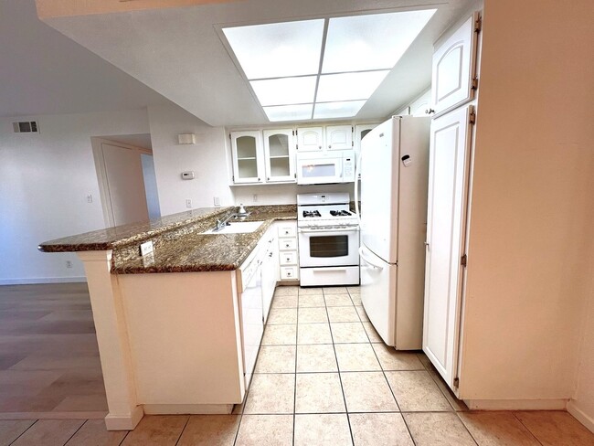 Building Photo - Ground Level 2 Bedroom Condo with Private Patio in Gated Community for Lease