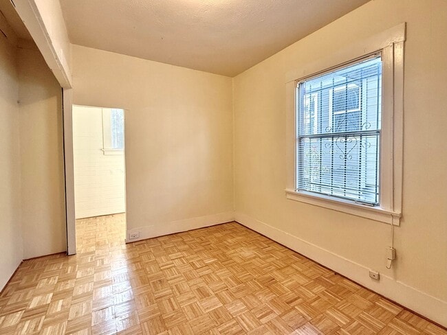 Building Photo - Cozy 2+bdrm/1 bath home w/a huge basement, washer/dryer, & off street pkg, space in the heart of ...